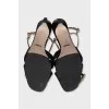 Leather sandals with gold straps