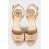 Suede sandals with rhinestone logo