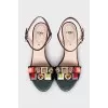 Sandals with volumetric decor