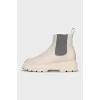 White leather boots with elastic bands