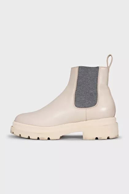White leather boots with elastic bands