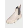 White leather boots with elastic bands