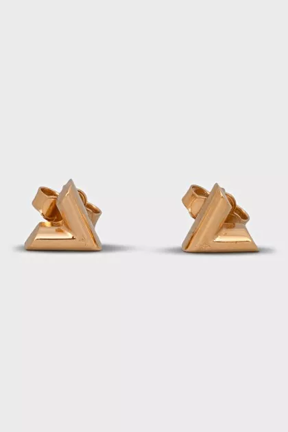 Golden earrings of a figured shape