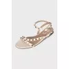 Leather sandals decorated with studs