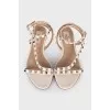 Leather sandals decorated with studs