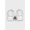 White sneakers with perforations