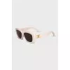 Rectangular sunglasses with white frames