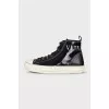 Leather sneakers decorated with sequins