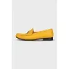 Yellow loafers with gold decor