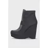 Ankle boots with a wedge heel and a zipper