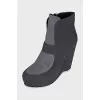 Ankle boots with a wedge heel and a zipper