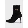 Suede ankle boots with a zipper