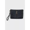 Quilted leather clutch with signature logo