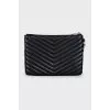 Quilted leather clutch with signature logo