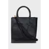 Black bag with embossed logo