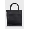 Black bag with embossed logo