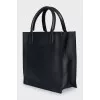 Black bag with embossed logo