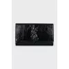 Belle de Jour patent leather clutch