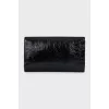 Belle de Jour patent leather clutch