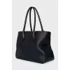 Black tote with signature clochette