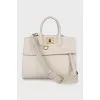 Leather bag with suede inserts