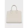 Leather bag with suede inserts