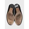 Black ballet flats with decor