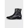 Men's black boots with a zipper