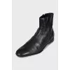 Men's black boots with a zipper