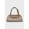 Canvas bag with a signature monogram