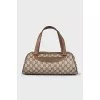 Canvas bag with a signature monogram