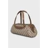 Canvas bag with a signature monogram