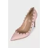 Leather pumps with gold trim