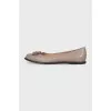 Leather ballet flats decorated with crystals