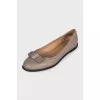Leather ballet flats decorated with crystals
