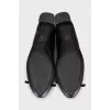 Shoes with a trapezoid heel