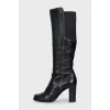 Black boots with textile inserts