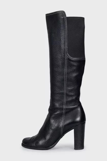 Black boots with textile inserts