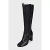 Black boots with textile inserts