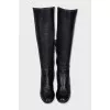 Black boots with textile inserts