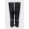 Black boots with textile inserts