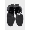 Black boots with textile inserts