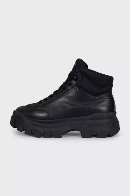 Leather boots with textile elements