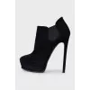 Suede ankle boots with a textured sole