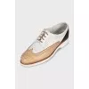 Leather brogues with perforations