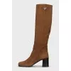 Suede boots with a trapezoid heel