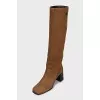 Suede boots with a trapezoid heel
