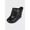 Leather shoes with a textured wedge heel