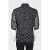 Translucent blouse text print shirt