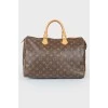 Коричнева шкіряна сумка Speedy з фірмовим забарвленням бренду